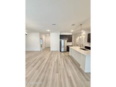 Experience refined, single-story living in this spacious 2,338 on The Grand Club Cypress Course in Florida - for sale on GolfHomes.com, golf home, golf lot