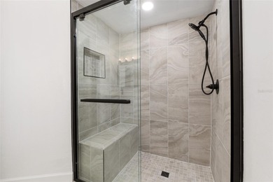 Enjoy easy, maintenance-free living in this beautifully restored on Turkey Creek Golf and Country Club in Florida - for sale on GolfHomes.com, golf home, golf lot