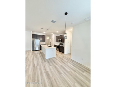 Experience refined, single-story living in this spacious 2,338 on The Grand Club Cypress Course in Florida - for sale on GolfHomes.com, golf home, golf lot