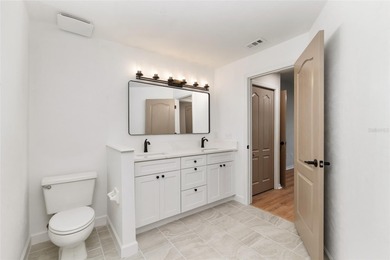 Enjoy easy, maintenance-free living in this beautifully restored on Turkey Creek Golf and Country Club in Florida - for sale on GolfHomes.com, golf home, golf lot