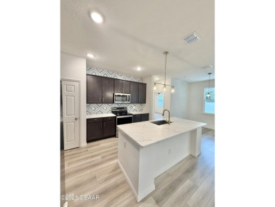 Experience refined, single-story living in this spacious 2,338 on The Grand Club Cypress Course in Florida - for sale on GolfHomes.com, golf home, golf lot