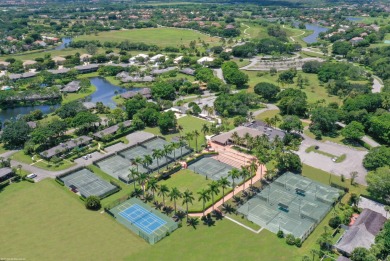 Spectacular lake and preserve views from one of the largest lots on Palm Beach Polo and Country Club in Florida - for sale on GolfHomes.com, golf home, golf lot