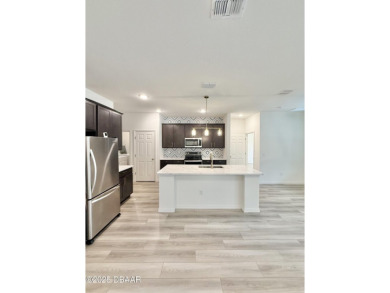 Experience refined, single-story living in this spacious 2,338 on The Grand Club Cypress Course in Florida - for sale on GolfHomes.com, golf home, golf lot