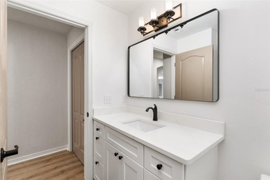 Enjoy easy, maintenance-free living in this beautifully restored on Turkey Creek Golf and Country Club in Florida - for sale on GolfHomes.com, golf home, golf lot