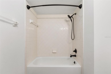 Enjoy easy, maintenance-free living in this beautifully restored on Turkey Creek Golf and Country Club in Florida - for sale on GolfHomes.com, golf home, golf lot