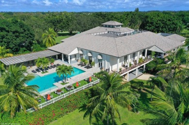 Spectacular lake and preserve views from one of the largest lots on Palm Beach Polo and Country Club in Florida - for sale on GolfHomes.com, golf home, golf lot