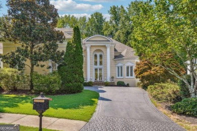 Experience three fully finished levels of exceptional living on The Golf Club of Georgia in Georgia - for sale on GolfHomes.com, golf home, golf lot