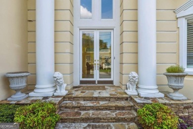 Experience three fully finished levels of exceptional living on The Golf Club of Georgia in Georgia - for sale on GolfHomes.com, golf home, golf lot