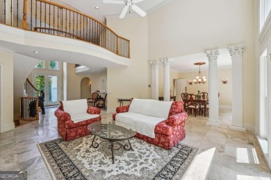 Experience three fully finished levels of exceptional living on The Golf Club of Georgia in Georgia - for sale on GolfHomes.com, golf home, golf lot