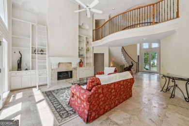 Experience three fully finished levels of exceptional living on The Golf Club of Georgia in Georgia - for sale on GolfHomes.com, golf home, golf lot
