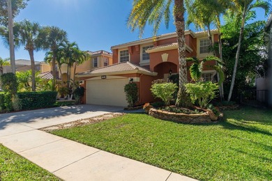 Beautifully maintained 4-bedroom, 2.5-bath home with a 2-car on The Links At Madison Green in Florida - for sale on GolfHomes.com, golf home, golf lot