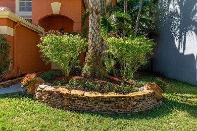 Beautifully maintained 4-bedroom, 2.5-bath home with a 2-car on The Links At Madison Green in Florida - for sale on GolfHomes.com, golf home, golf lot