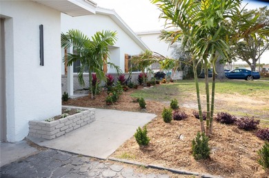 This beautifully remodeled home is in one of St Petersburg's on Pasadena Yacht and Country Club in Florida - for sale on GolfHomes.com, golf home, golf lot