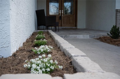 This beautifully remodeled home is in one of St Petersburg's on Pasadena Yacht and Country Club in Florida - for sale on GolfHomes.com, golf home, golf lot
