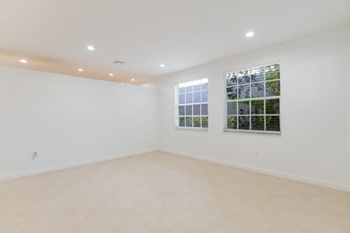 Beautifully maintained 4-bedroom, 2.5-bath home with a 2-car on The Links At Madison Green in Florida - for sale on GolfHomes.com, golf home, golf lot