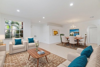 Beautifully maintained 4-bedroom, 2.5-bath home with a 2-car on The Links At Madison Green in Florida - for sale on GolfHomes.com, golf home, golf lot