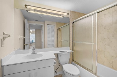 Ground Floor End-Unit Condo in Fairway Trace at Peridia Golf & on Peridia Golf and Country Club in Florida - for sale on GolfHomes.com, golf home, golf lot