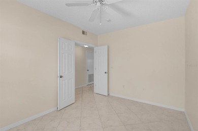Ground Floor End-Unit Condo in Fairway Trace at Peridia Golf & on Peridia Golf and Country Club in Florida - for sale on GolfHomes.com, golf home, golf lot