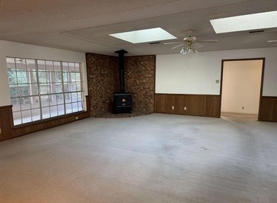 Discover this 3 bedroom, 2 bathroom home nestled on a on Hide-A-Way Lake Golf Course in Texas - for sale on GolfHomes.com, golf home, golf lot