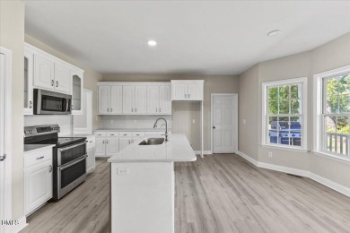 Beautifully updated and designed with timeless Southern charm on The Neuse Golf Club in North Carolina - for sale on GolfHomes.com, golf home, golf lot
