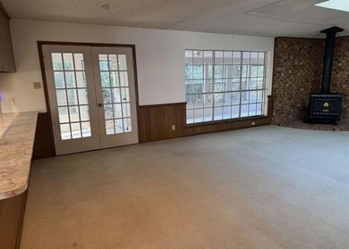 Discover this 3 bedroom, 2 bathroom home nestled on a on Hide-A-Way Lake Golf Course in Texas - for sale on GolfHomes.com, golf home, golf lot