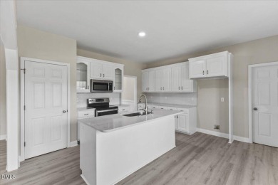 Beautifully updated and designed with timeless Southern charm on The Neuse Golf Club in North Carolina - for sale on GolfHomes.com, golf home, golf lot
