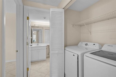 Ground Floor End-Unit Condo in Fairway Trace at Peridia Golf & on Peridia Golf and Country Club in Florida - for sale on GolfHomes.com, golf home, golf lot