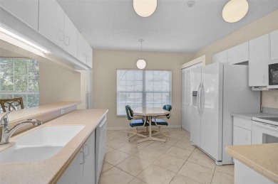 Ground Floor End-Unit Condo in Fairway Trace at Peridia Golf & on Peridia Golf and Country Club in Florida - for sale on GolfHomes.com, golf home, golf lot