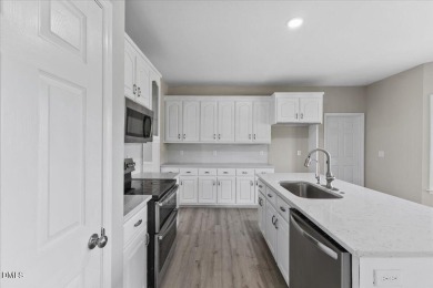 Beautifully updated and designed with timeless Southern charm on The Neuse Golf Club in North Carolina - for sale on GolfHomes.com, golf home, golf lot