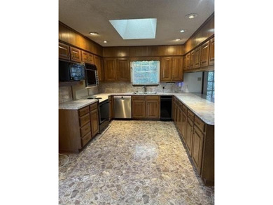 Discover this 3 bedroom, 2 bathroom home nestled on a on Hide-A-Way Lake Golf Course in Texas - for sale on GolfHomes.com, golf home, golf lot