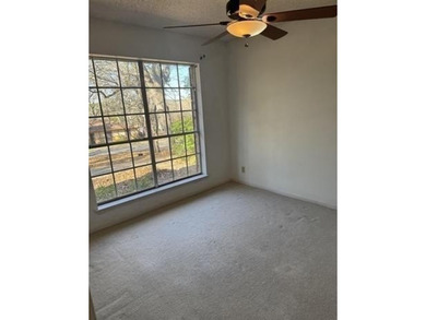 Discover this 3 bedroom, 2 bathroom home nestled on a on Hide-A-Way Lake Golf Course in Texas - for sale on GolfHomes.com, golf home, golf lot