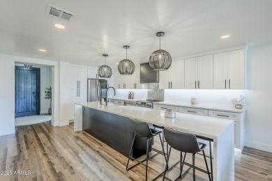 This fully REDESIGNED, Greek Isle-inspired upper-level condo in on Desert Forest Golf Club in Arizona - for sale on GolfHomes.com, golf home, golf lot