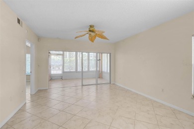 Ground Floor End-Unit Condo in Fairway Trace at Peridia Golf & on Peridia Golf and Country Club in Florida - for sale on GolfHomes.com, golf home, golf lot