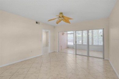 Ground Floor End-Unit Condo in Fairway Trace at Peridia Golf & on Peridia Golf and Country Club in Florida - for sale on GolfHomes.com, golf home, golf lot
