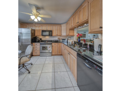 En-suite plus guest bedroom and bath with impressive room sizes on Atlantis Golf Club in Florida - for sale on GolfHomes.com, golf home, golf lot
