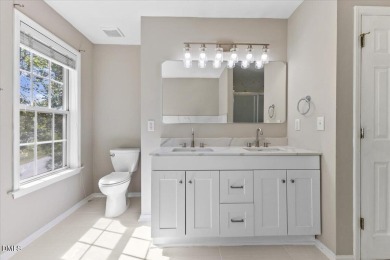 Beautifully updated and designed with timeless Southern charm on The Neuse Golf Club in North Carolina - for sale on GolfHomes.com, golf home, golf lot