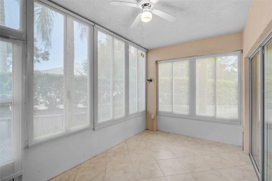 Ground Floor End-Unit Condo in Fairway Trace at Peridia Golf & on Peridia Golf and Country Club in Florida - for sale on GolfHomes.com, golf home, golf lot