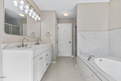 Beautifully updated and designed with timeless Southern charm on The Neuse Golf Club in North Carolina - for sale on GolfHomes.com, golf home, golf lot