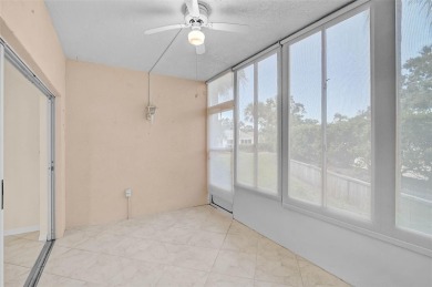 Ground Floor End-Unit Condo in Fairway Trace at Peridia Golf & on Peridia Golf and Country Club in Florida - for sale on GolfHomes.com, golf home, golf lot