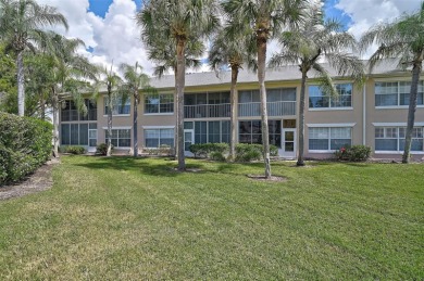 Ground Floor End-Unit Condo in Fairway Trace at Peridia Golf & on Peridia Golf and Country Club in Florida - for sale on GolfHomes.com, golf home, golf lot