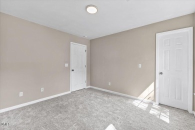 Beautifully updated and designed with timeless Southern charm on The Neuse Golf Club in North Carolina - for sale on GolfHomes.com, golf home, golf lot