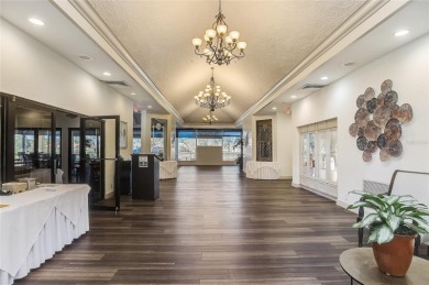 Ground Floor End-Unit Condo in Fairway Trace at Peridia Golf & on Peridia Golf and Country Club in Florida - for sale on GolfHomes.com, golf home, golf lot