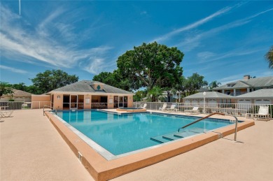 Ground Floor End-Unit Condo in Fairway Trace at Peridia Golf & on Peridia Golf and Country Club in Florida - for sale on GolfHomes.com, golf home, golf lot