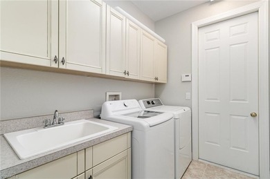 Toll Brothers built a range of single-family homes in Belle Lago on Estero Country Club in Florida - for sale on GolfHomes.com, golf home, golf lot