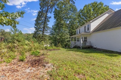 Beautifully updated and designed with timeless Southern charm on The Neuse Golf Club in North Carolina - for sale on GolfHomes.com, golf home, golf lot