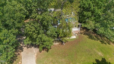 Beautifully updated and designed with timeless Southern charm on The Neuse Golf Club in North Carolina - for sale on GolfHomes.com, golf home, golf lot