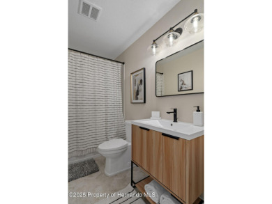 Model Perfect Luxury Villa with Golf Course Views! Discover on Heritage Pines Country Club in Florida - for sale on GolfHomes.com, golf home, golf lot