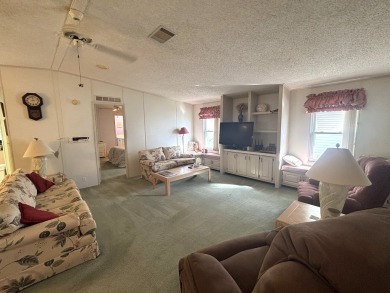 This home is located within a 55 + resort style leased land on Big Cypress Golf and Country Club in Florida - for sale on GolfHomes.com, golf home, golf lot