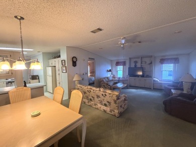 This home is located within a 55 + resort style leased land on Big Cypress Golf and Country Club in Florida - for sale on GolfHomes.com, golf home, golf lot