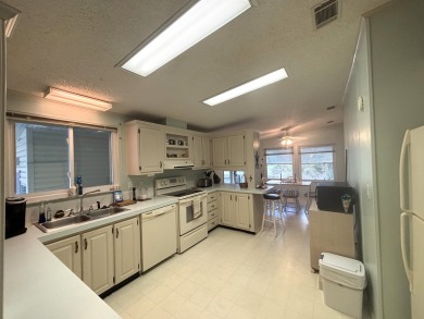This home is located within a 55 + resort style leased land on Big Cypress Golf and Country Club in Florida - for sale on GolfHomes.com, golf home, golf lot
